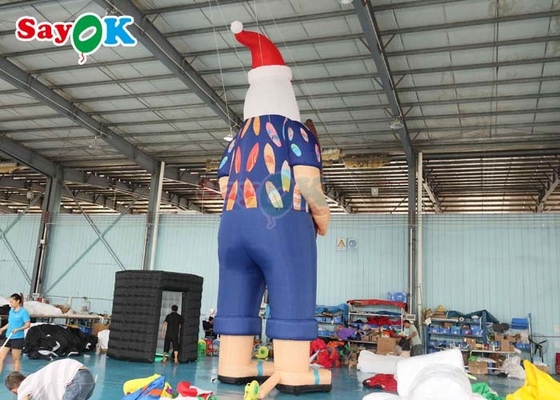 Modelo de decoración navideña hawaiana Papá Noel inflable en la playa Tamaño 7.6m
