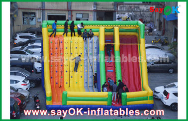 Deslizador inflable para adultos 9.5*7.5*6.5m Deslizador inflable colorido con pared de escalada para parque de diversiones